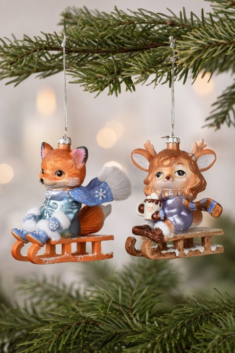 Glass ornament: Reindeer girl on a sled (124024)