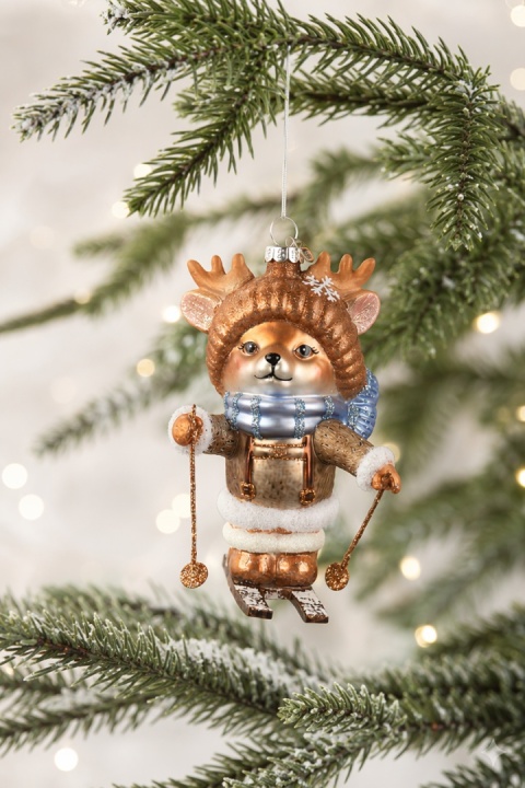 Glass bauble: Teddy bear in a reindeer hat on skis (124029)
